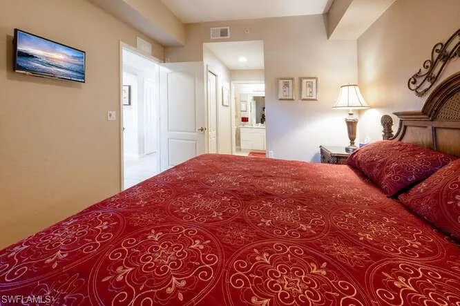 Bedroom featuring ensuite bathroom