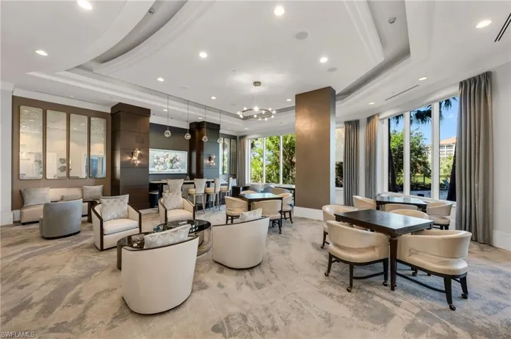Social Room featuring crown molding and recessed lighting