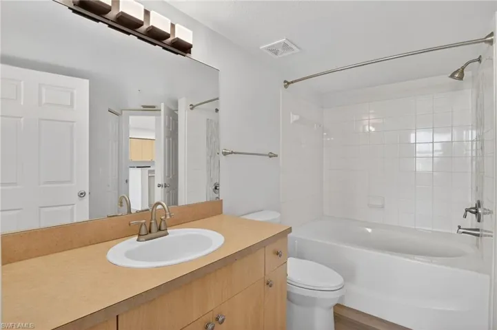 Full bathroom with vanity and bathing tub / shower combination