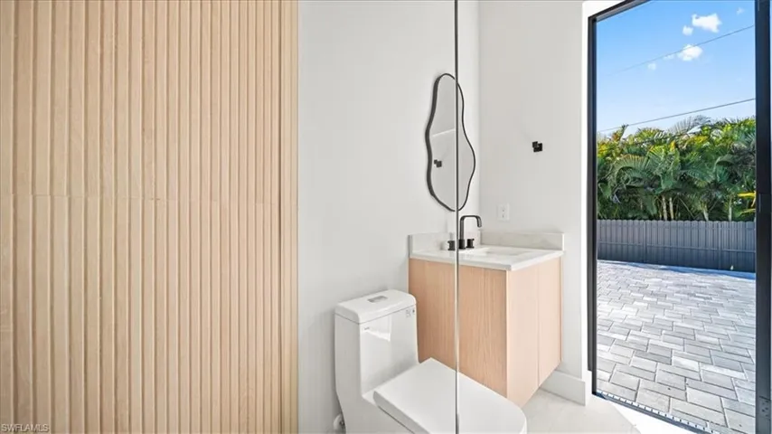 Half bath with vanity and toilet
