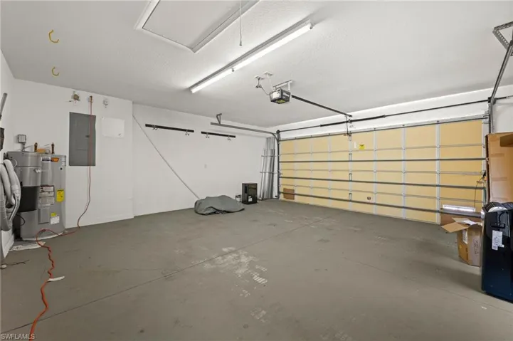 Garage with electric panel and water heater