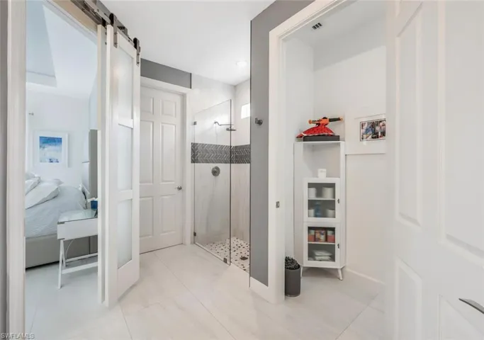 Bathroom with a tile shower