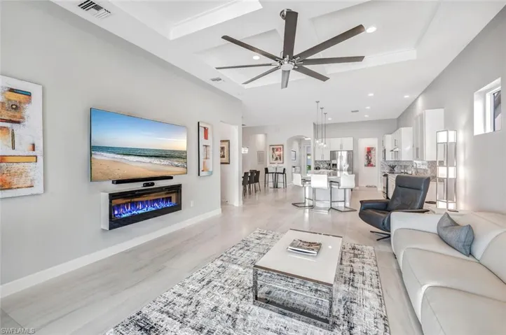 Living room featuring ceiling fan