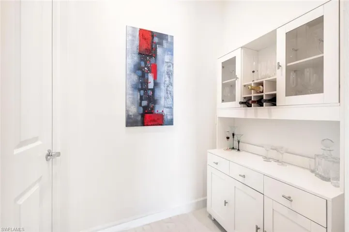Bar with white cabinets