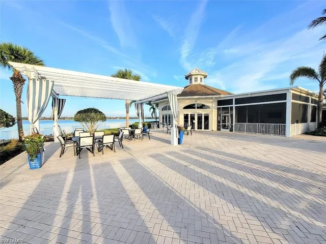 Restaurant Outdoor Seating under Pergola with Lake View