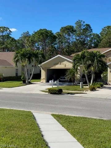 View of asphalt road with sidewalks