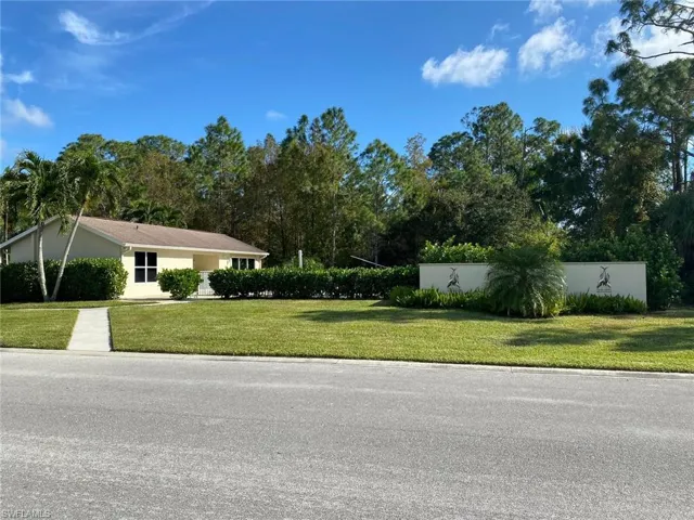 View of front of home featuring a front lawn