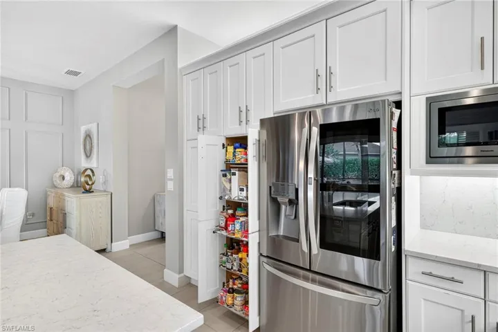 Upgraded appliances plus pull-outs in pantry and every lower level cabinet!