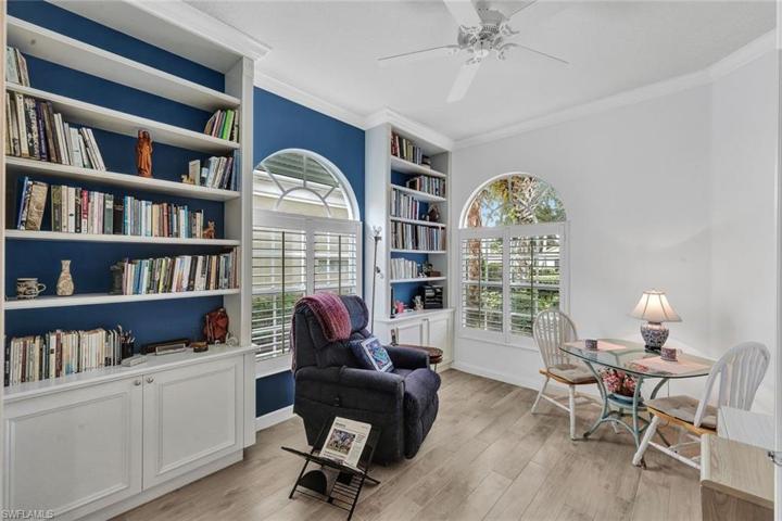 Den with Built-in Cabinets & Plantation Shutters