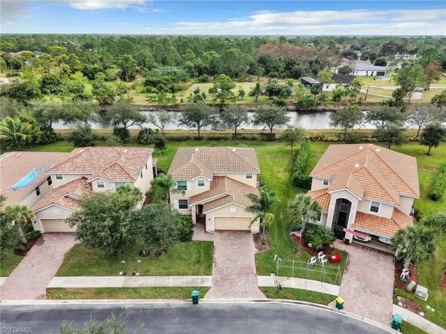 Aerial view of residential area with a nearby body of water
