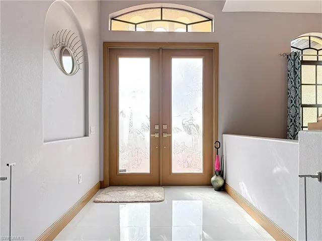 Doorway featuring french doors