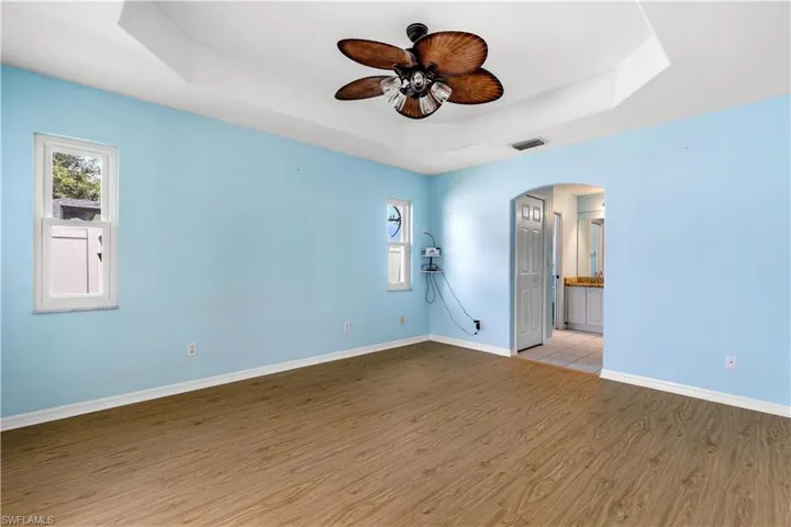 Master bedroom with tray ceiling
