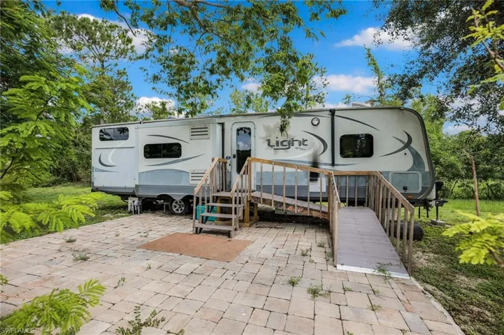 Camper with electric and plumbing