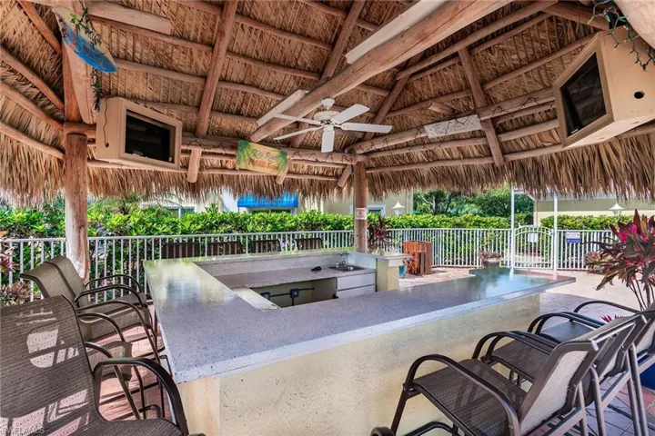View of patio / terrace featuring a gazebo, a ceiling fan, and area for grilling