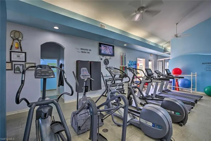 Gym featuring ceiling fan