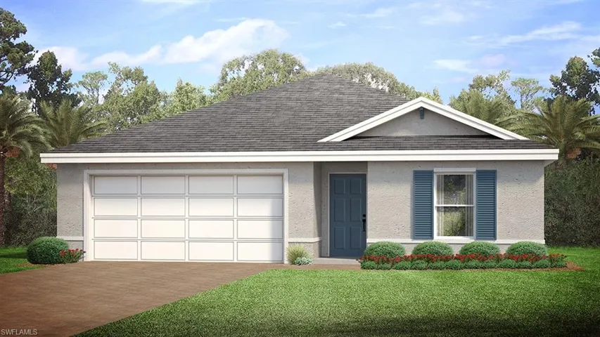 View of front of property with a front yard and a garage