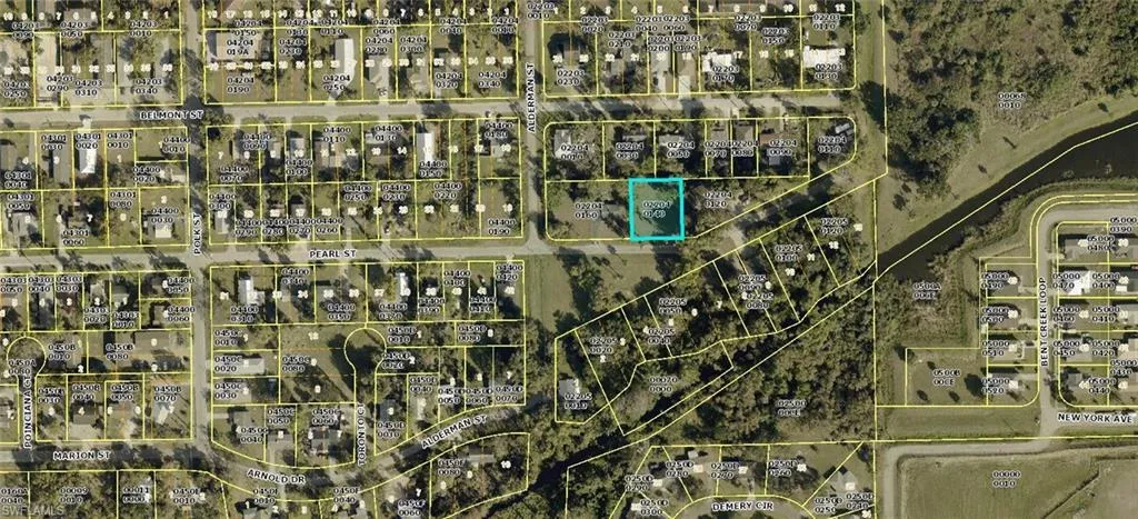 Aerial overview of property's location featuring property boundaries highlighted