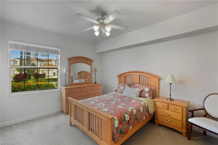 Bedroom featuring carpet floors and a ceiling fan