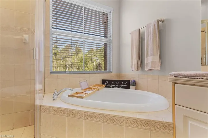 Bathroom with separate shower and tub