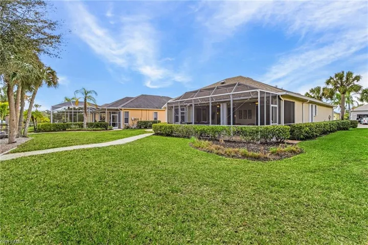 View of home's community featuring a sunroom