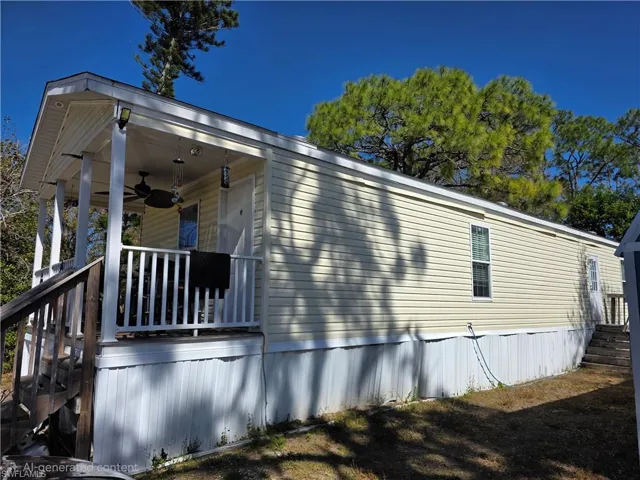View of property exterior featuring ceiling fan