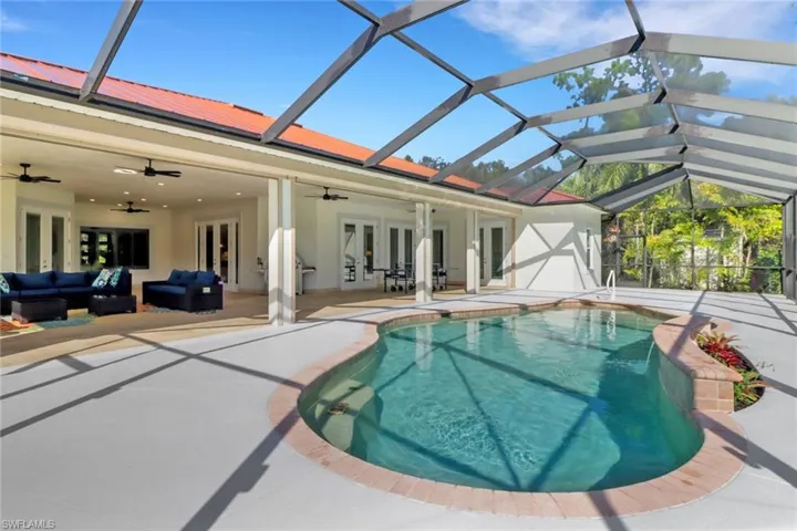 View of swimming pool with a patio