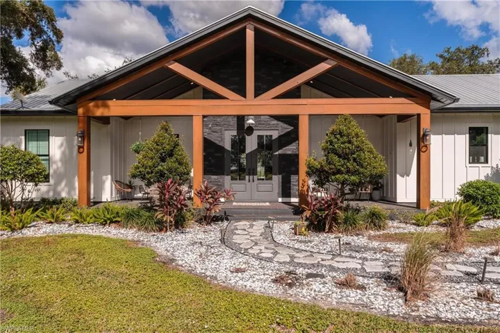 Front view of house with french doors