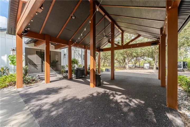 View of carport with a gazebo and ceiling fan