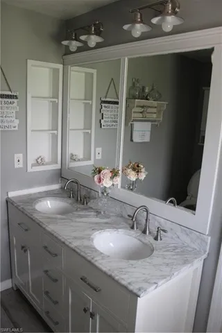 Master Bathroom featuring double sink and vanity
