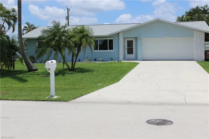 Ranch-style home with a 2 car garage