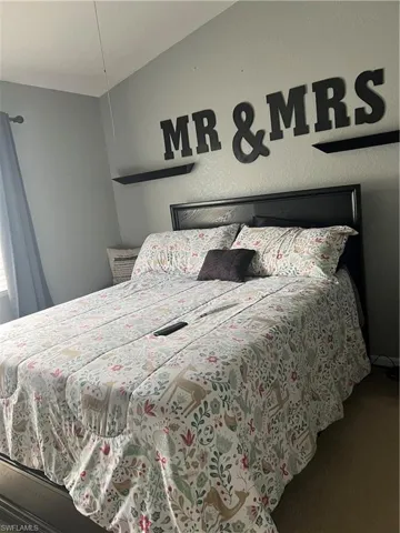 Bedroom with carpet flooring