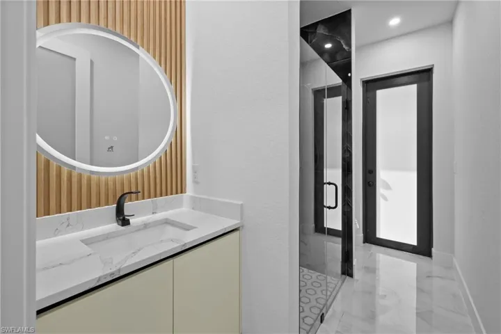 Bathroom with vanity and walk in shower