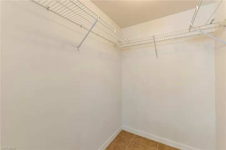 28330 Pine Haven Way Unit 67 Bonita Springs FL 34135 - Owner's walk in closet
