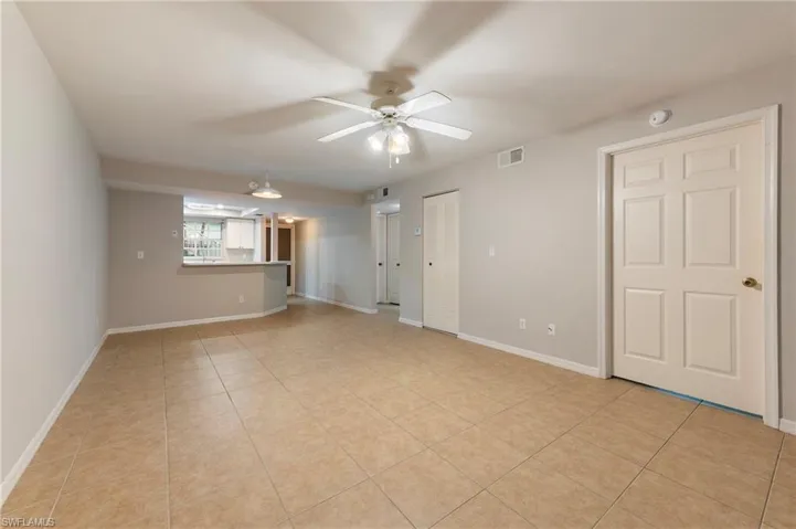 28330 Pine Haven Way Unit 67 Bonita Springs FL 34135 - Dining and living areas