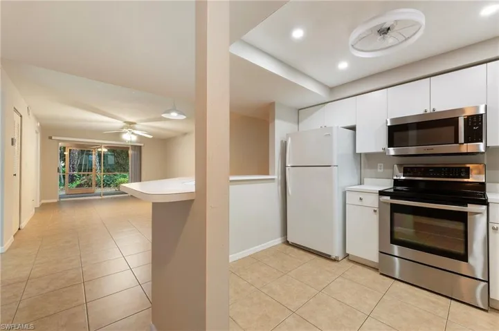 28330 Pine Haven Way Unit 67 Bonita Springs FL 34135 - Kitchen open to dining/living area