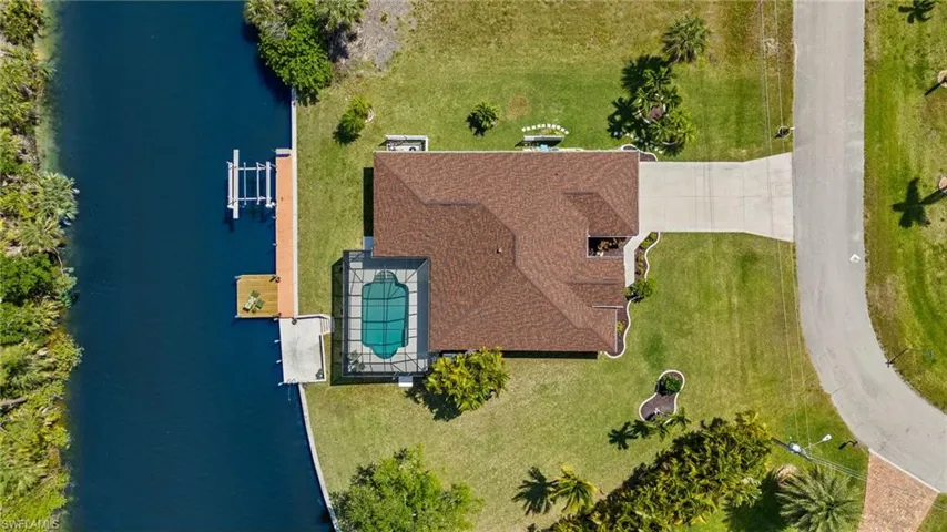 Rooftop view of home and pool