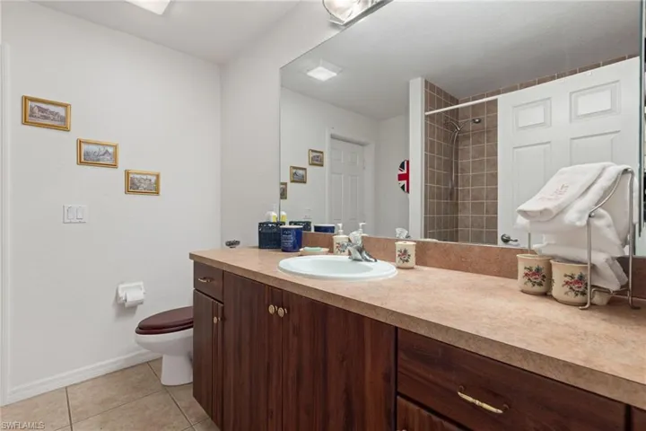 guest bath and access to pool area