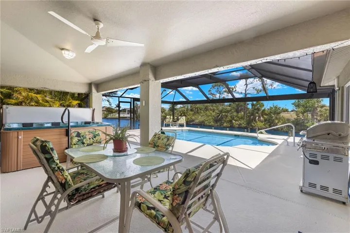 Patio under truss includes 6 person hot tub