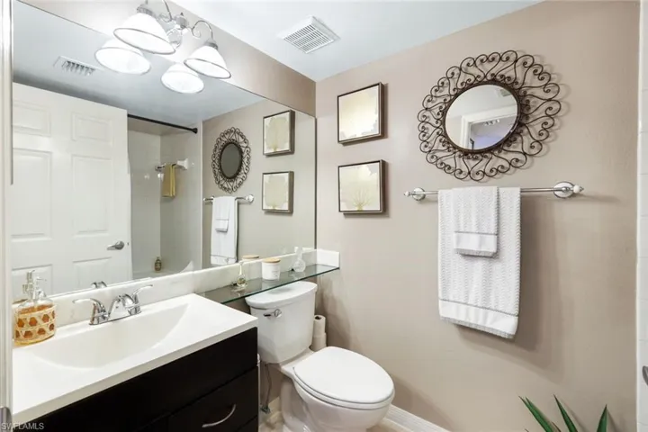 Newer Vanity and the bathroom has  tub-shower combination