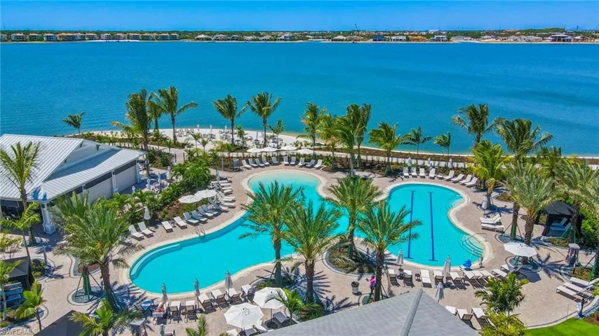 Community pool with a water view