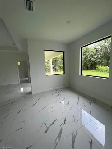 View of tiled empty room