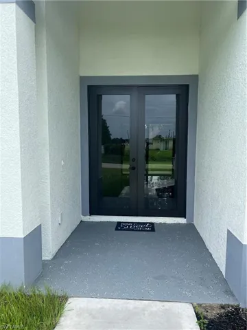 View of exterior entry with french doors