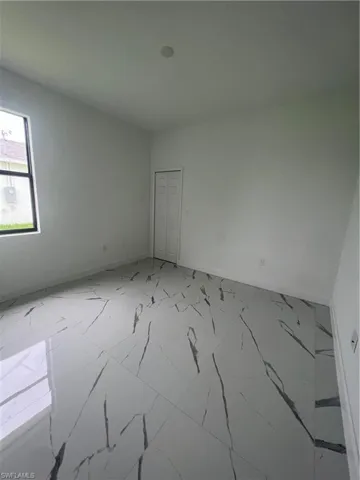 View of tiled spare room