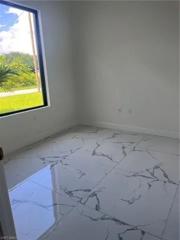 View of tiled empty room