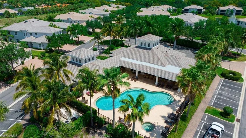 Aerial perspective of suburban area with a pool