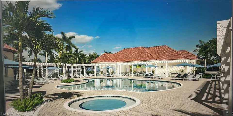 Community pool featuring a community hot tub and a patio area