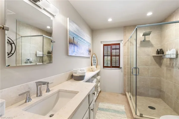 Bathroom 3 is updated with Quartz Counters and Large Tile Bath