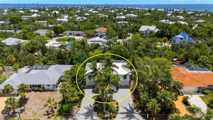 Aerial view of residential area with a nearby body of water