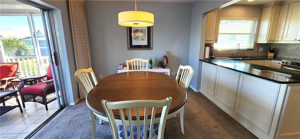 Dining room with carpet floors