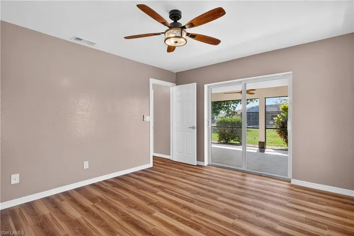 Primary bedroom with plenty of room for dresser/television